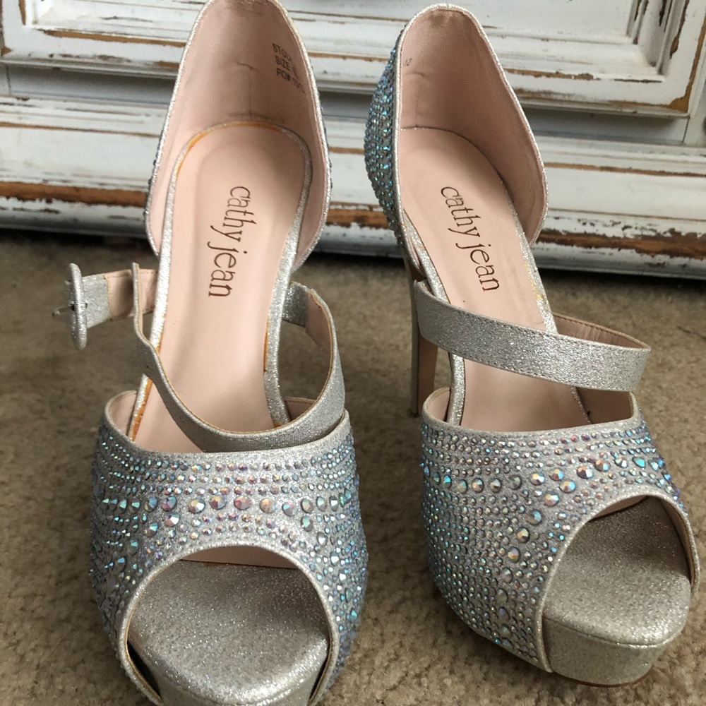 Rhinestone covered strap heel